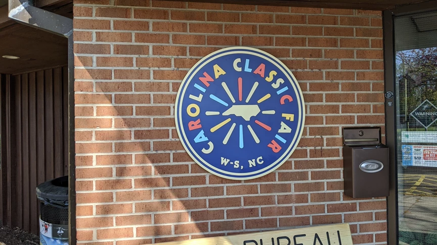 Dimensional Circular Stud Mounted Sign for Carolina Classic Fair in Winston-Salem, NC